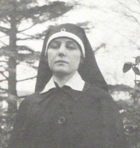 Photograph of Teresa Hulton in a blue silk Red Cross headdress